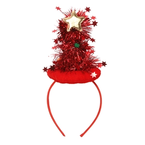 Detail of red tinsel Christmas tree headband with golden star and plush red velvet base