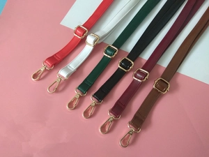 Detail view of adjustable PU leather shoulder straps in six colors with gold hardware