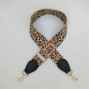 Adjustable leopard print wide shoulder strap with gold metal hooks and black leather ends