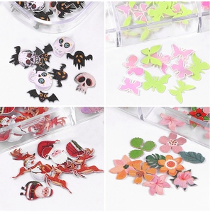 Macro shot of 12-grid nail art wood pulp flakes with Halloween and Christmas motifs