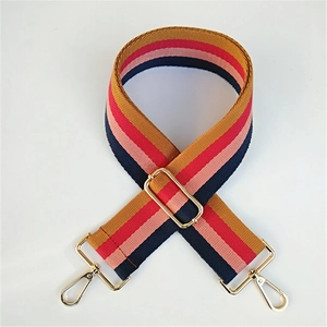 Adjustable wide canvas shoulder strap with colorful stripes and gold metal hardware