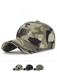 Detail of tactical camouflage baseball cap with US shield emblem and embroidered brim