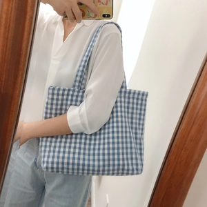 Classic blue and white checkered canvas tote bag with long shoulder straps for daily use