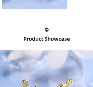 Detailed close-up of a golden crown stud earring with pave-set zircon crystals