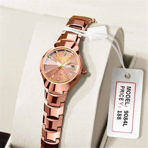 Detailed close-up of rose gold watch with purple dial and shimmering crystal markers