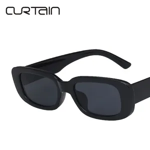 Minimalist thick frame square sunglasses in black with dark lenses for retro street style
