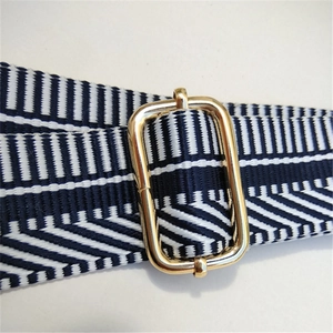 Adjustable navy and white embroidered shoulder strap with golden metal buckle for crossbody bags