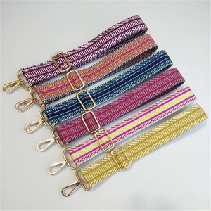 Adjustable embroidered bag straps with colorful patterns and golden metal buckles