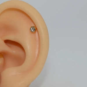 Sterile disposable ear piercing tool with 316L stainless steel gold cubic zirconia stud