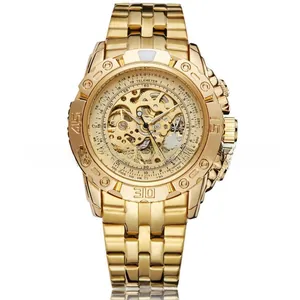 Macro view of gold automatic watch dial with skeleton movement and metal strap