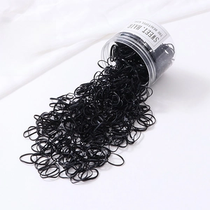 Détail de 800 élastiques à cheveux noirs épais pour enfants dans une boîte ronde