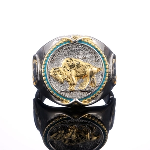 Two-tone buffalo nickel signet ring featuring turquoise enamel inlay and gold bison relief