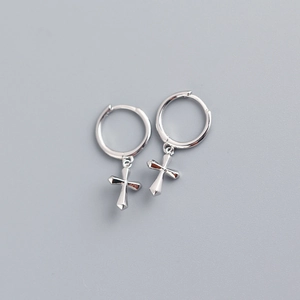 Detailed close-up of S925 sterling silver cross earrings with polished finish and hoop buckle