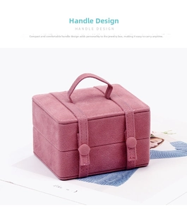 Pink velvet jewelry organizer detail showing the portable handle and snap button strap