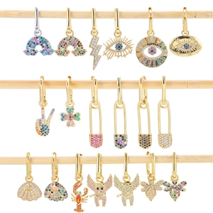 Gold paperclip hoop earrings set with colorful zircon stones in rainbow animal shapes