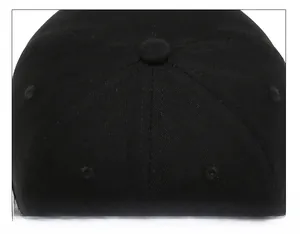 Close-up of strict cap suture technique on a black short brim baseball cap top