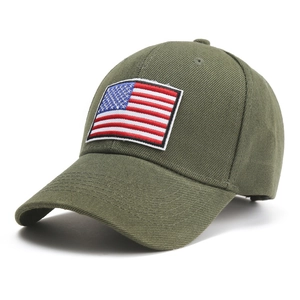 Detailed embroidery of the American flag patch on a durable army green tactical baseball cap