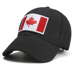 Black cotton baseball cap with embroidered Canada flag patch on front panel