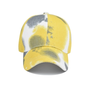 Close-up of tie-dye cotton canvas texture and stitching on the yellow and grey sun hat