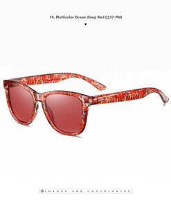 Detail view of colorful printed frames and deep red polarized lenses on sunglasses
