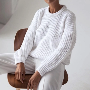 Women's white crewneck chunky knit sweater with drop shoulder design in a relaxed fit