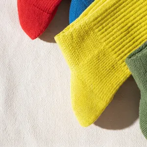 Detailed macro view of colorful ribbed cotton socks with thick towel bottom texture