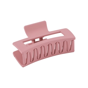 Large matte dusty pink hair claw clip with rectangular hollow design for women