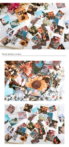 Close-up of vintage flower stickers with realistic sunflower and rose designs in a box