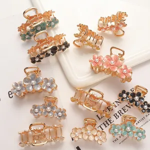 Elegant gold alloy flower hair claws with colorful petals and pearls in Morandi tones