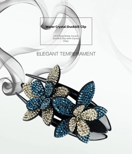 Detailed view of large rhinestone flower duckbill hair clip with blue and white crystals