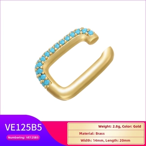 Detailed view of gold brass U-shaped ear cuff featuring blue-green beads and dimensions