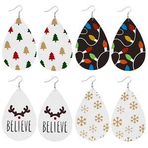 Set of four teardrop Christmas leather earrings featuring festive holiday patterns