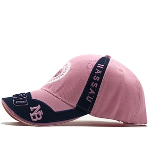 Pink and navy blue baseball cap with Nassau embroidery and NB detail side view