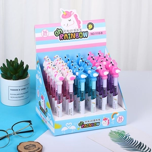 Close-up of cute cartoon unicorn and swan LED light-up ballpoint pens in a 36-pack box