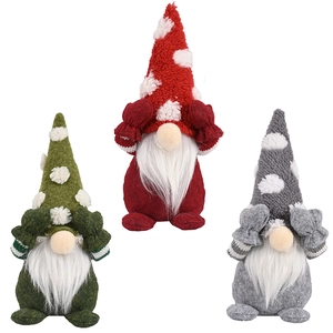 Three plush Christmas gnomes with white beards and polka dot hats in a no-see pose