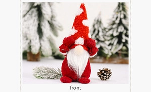 Detailed front view of a red faceless Christmas gnome with a polka dot hat and white beard
