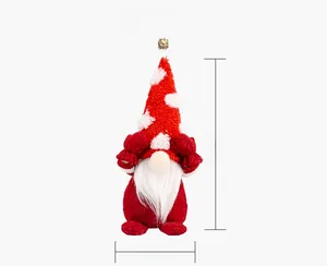 Size display of a red and white Christmas gnome plush doll measuring 24cm by 10cm