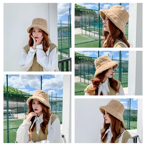 Detailed views of a beige plush bucket hat featuring soft faux fur texture and warm design