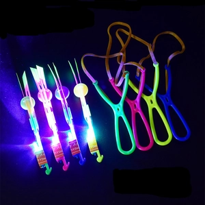 LED slingshot arrow toy set with four glowing flying helicopters and launchers