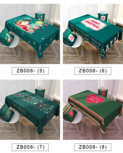 Detail of Nordic Christmas tablecloths with cartoon Santa and reindeer designs