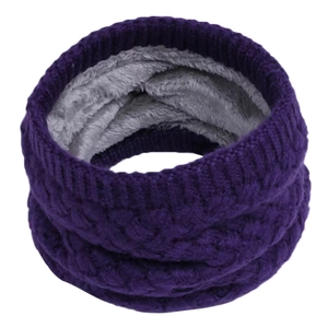 Detail of dark purple knitted neck warmer featuring thick gray fleece lining texture