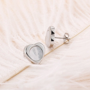 Elegant heart-shaped stainless steel earrings with natural shell inlay on pink feathers