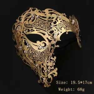 Detailed close-up of golden metal filigree mask with rhinestones, 19.5 by 17cm