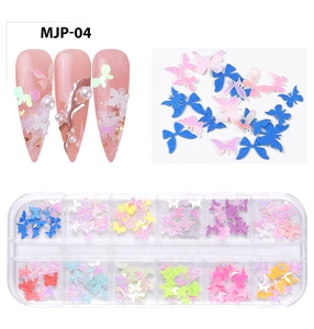 Detailed view of MJP-04 3D butterfly nail art charms set in a 12-compartment storage box