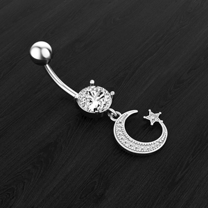Silver belly button ring with crescent moon and star pendant featuring sparkling cubic zirconia