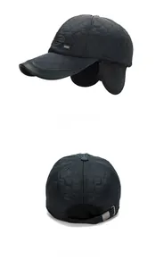 Detail of men's winter baseball cap with quilted texture and retractable ear flaps
