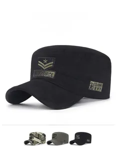 Detailed close-up of embroidered military patches on cotton canvas cadet caps
