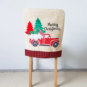 Linen Christmas chair cover featuring red truck, gnome motifs and Merry Christmas text