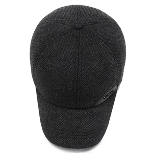 Thick winter baseball cap for men with warm ear protection and textured wool fabric