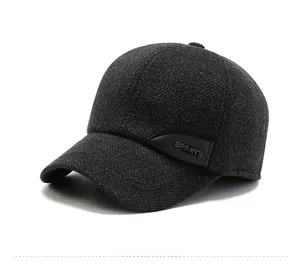 Detailed close-up of dark grey thick winter baseball cap fabric and SPORTS label